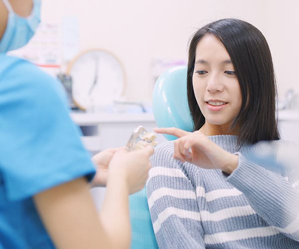 dentist talking to a patient